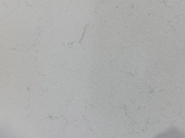 "These stunning quartzite countertops exude a timeless elega...