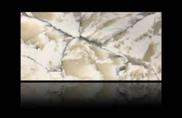 "These stunning quartz countertops feature a captivating ble...