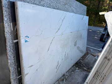 "An exquisite white countertop with delicate veining capture...