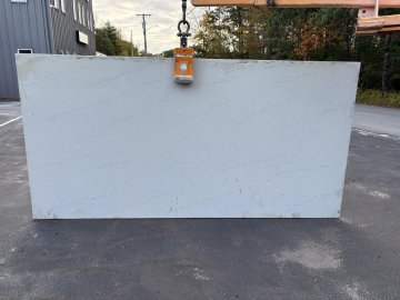 "An exquisite white countertop showcases delicate veining, o...