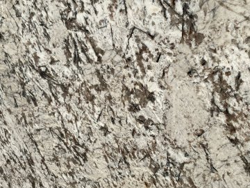 "The stunning granite countertops showcase a unique blend of...